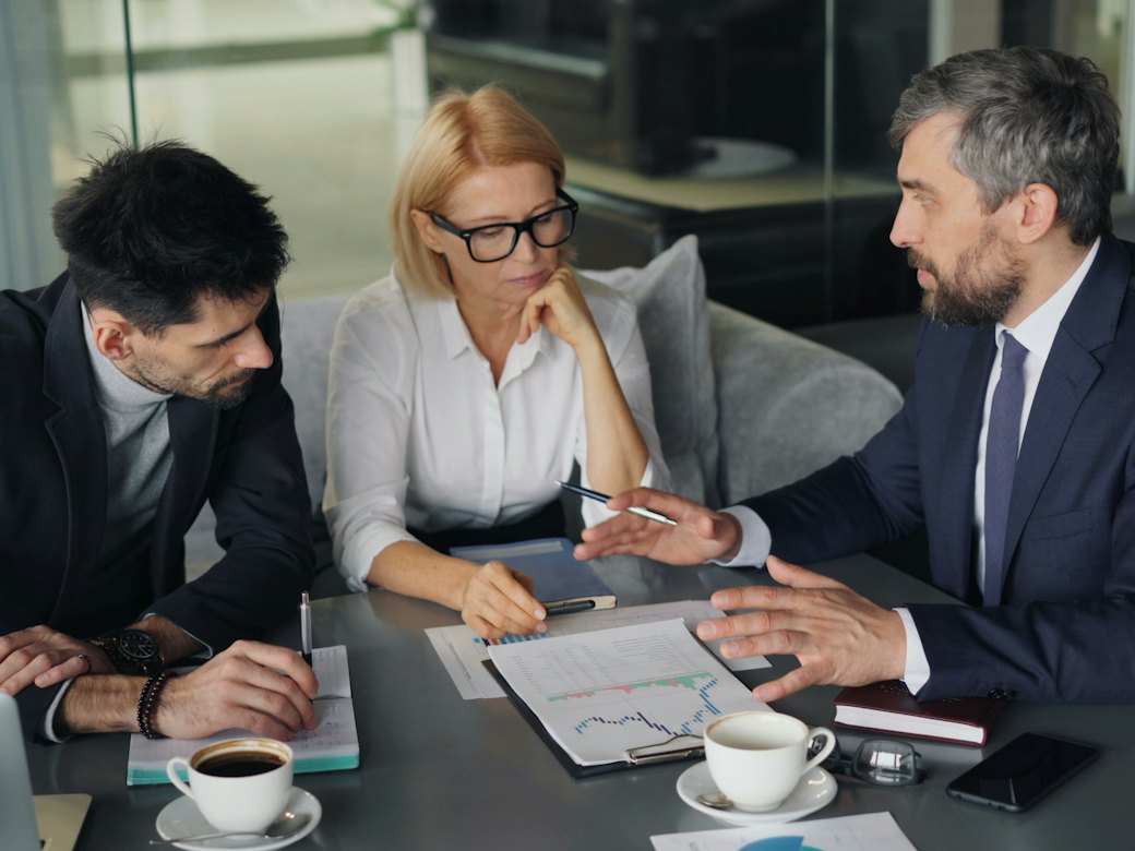 Financial advisor meeting with clients