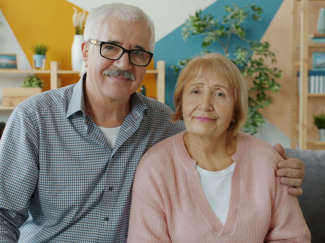 Smiling senior couple at home