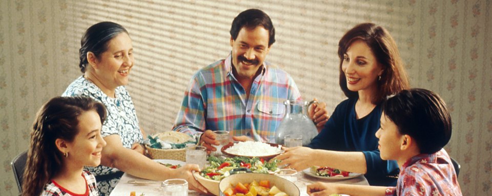 Family sharing a meal together