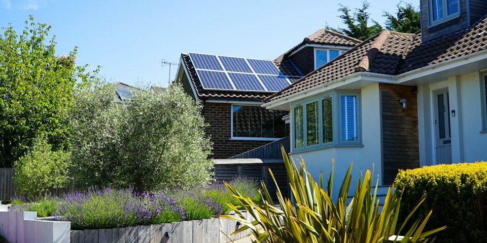 Home with rooftop solar panels